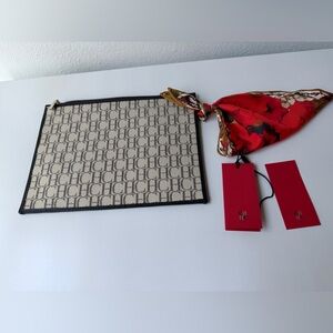 Carolina Herrera Continental Pouch.